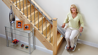 SLG-1000 stairlift inside with person