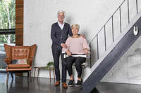 Woman on SLG-1100 stairlift